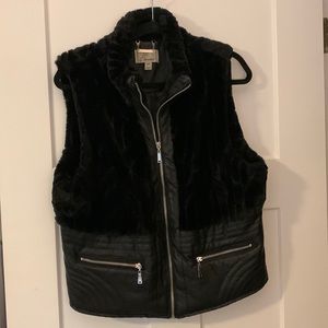 Faux fur Black vest with faux leather bottom. Size Med